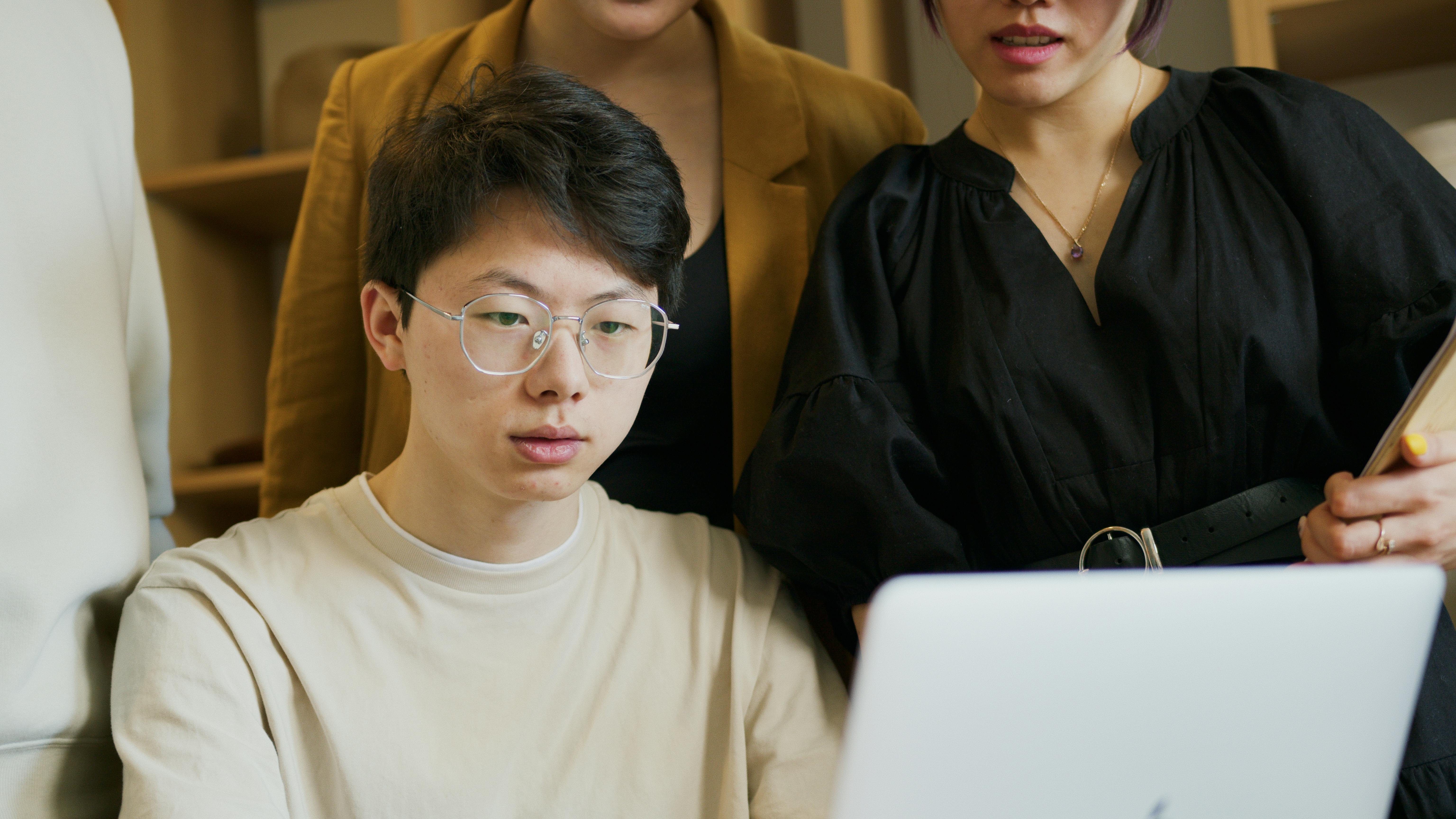 Man in White Crew Neck Shirt Wearing Eyeglasses